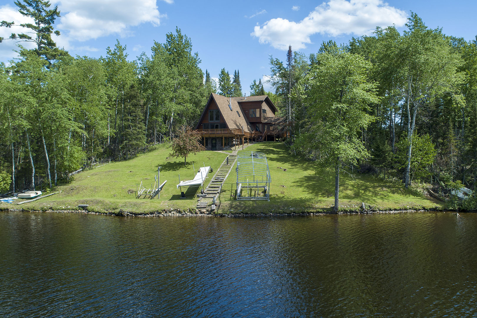 a-frame house on lake hillside