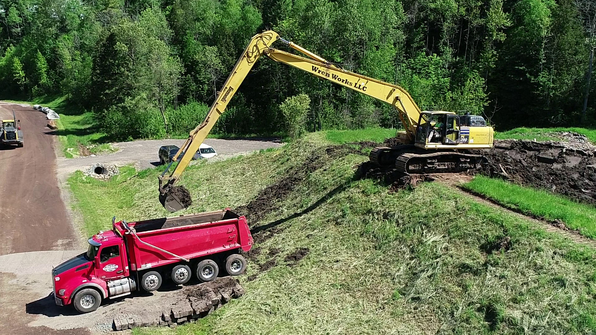 excavator loading dump truck